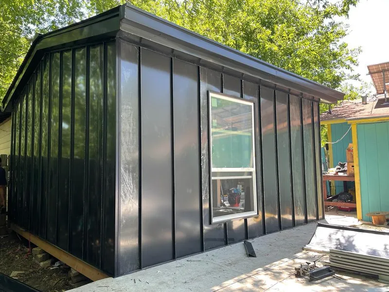 Black standing seam metal wall panels for Metal Roof Installation in North St. Paul