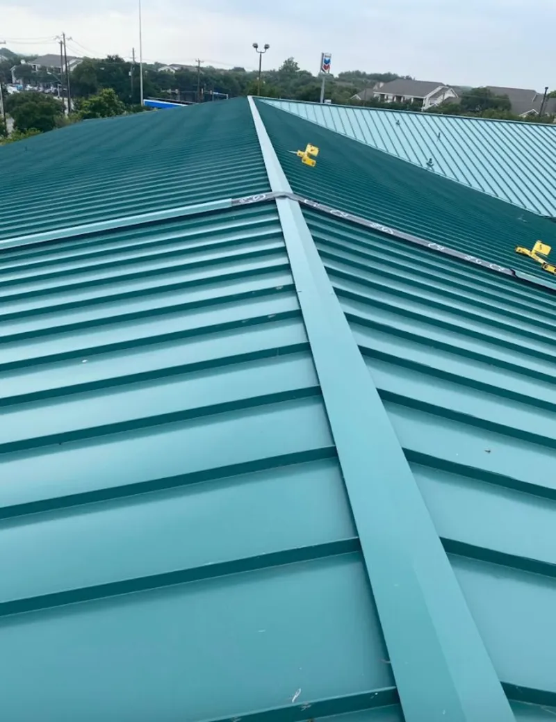 Green commercial metal roof ridge and valley for Metal Roof Repair in North St. Paul