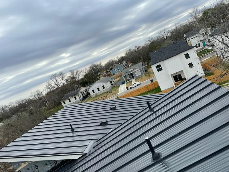 Standing seam metal roof panels with vents for Skylight Repair in North St. Paul